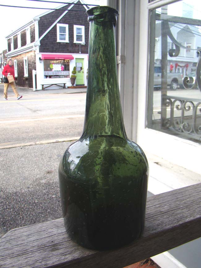 An unusually tall and rare 18th century English green glass wine bottle circa 1740 — image 3